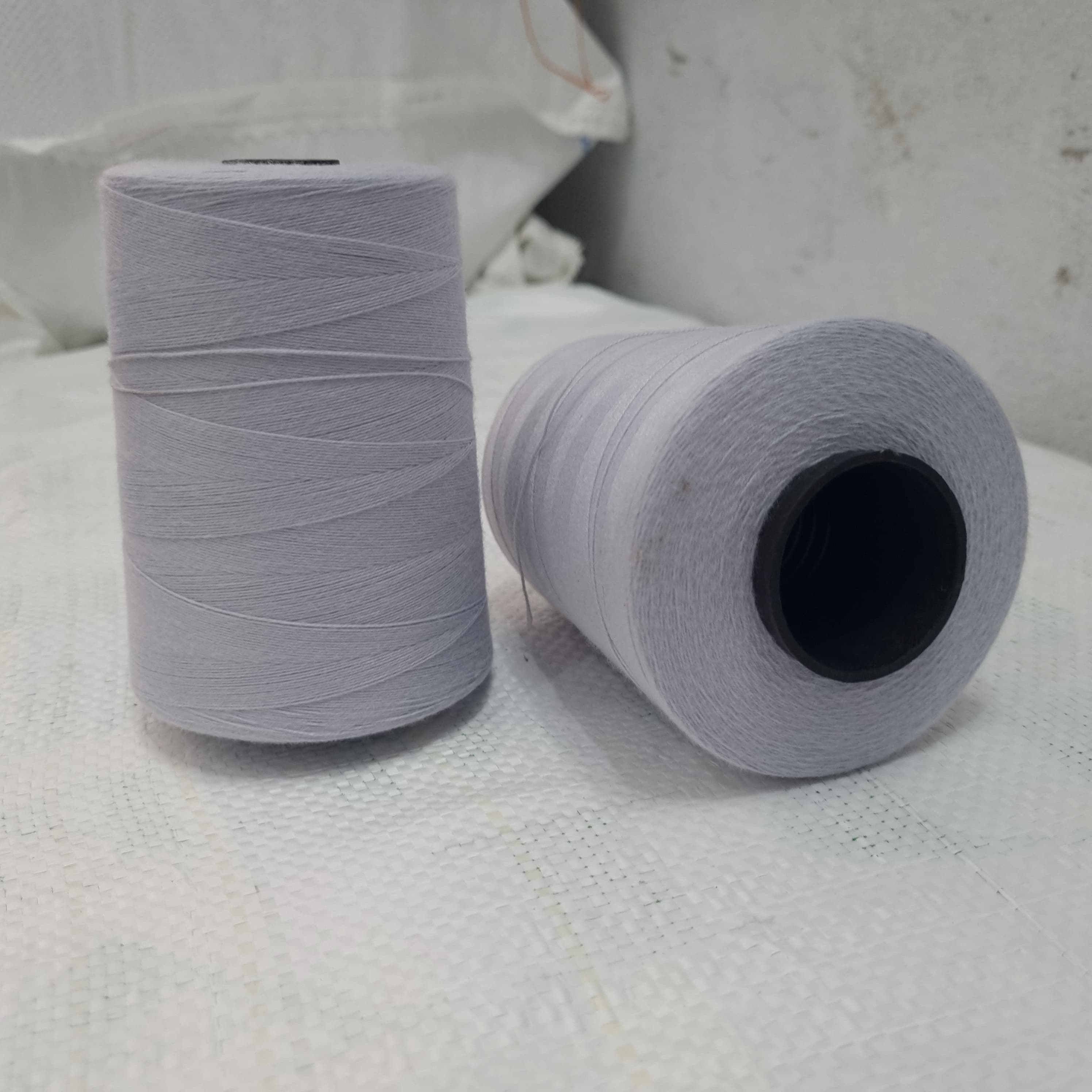 Blue 3-ply recycled polyester yarn spools, 15 count